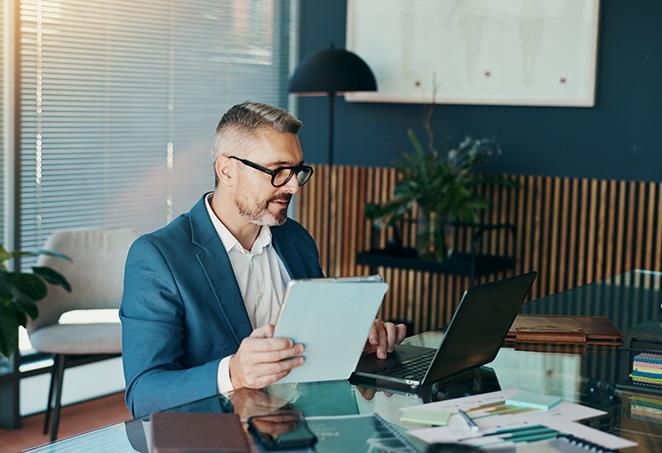 Insurance broker working at his desk
