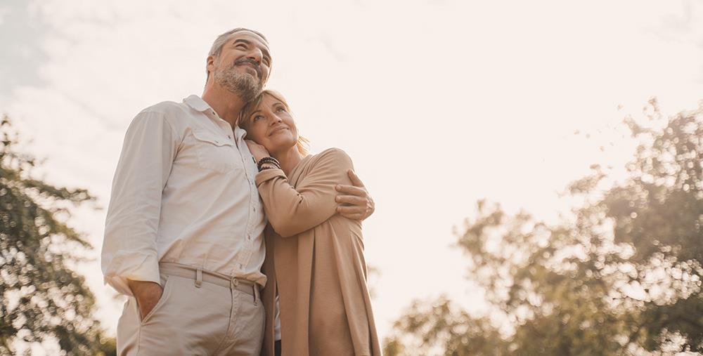 an older couple gazing into the distance